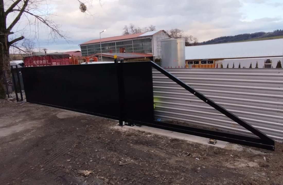 Black sliding gate with full infill